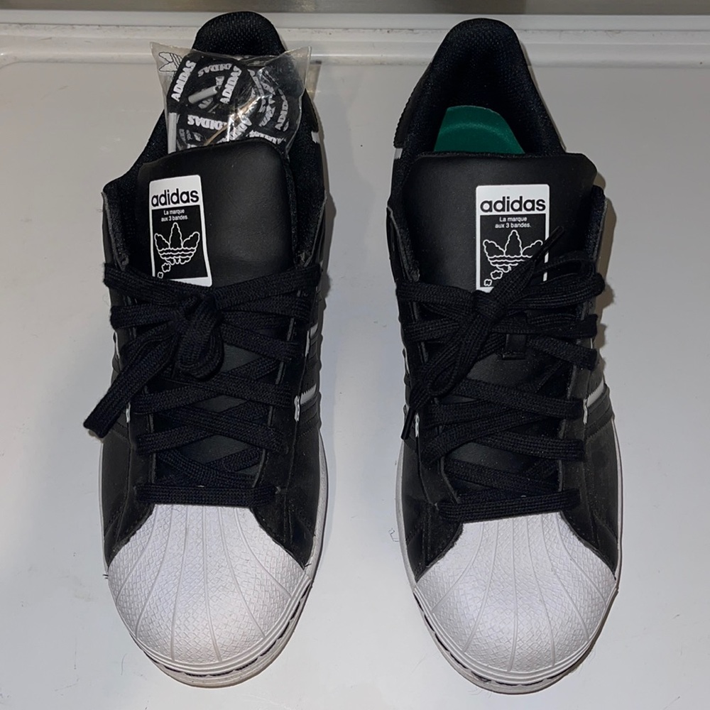 Black and white adidas men’s size 11